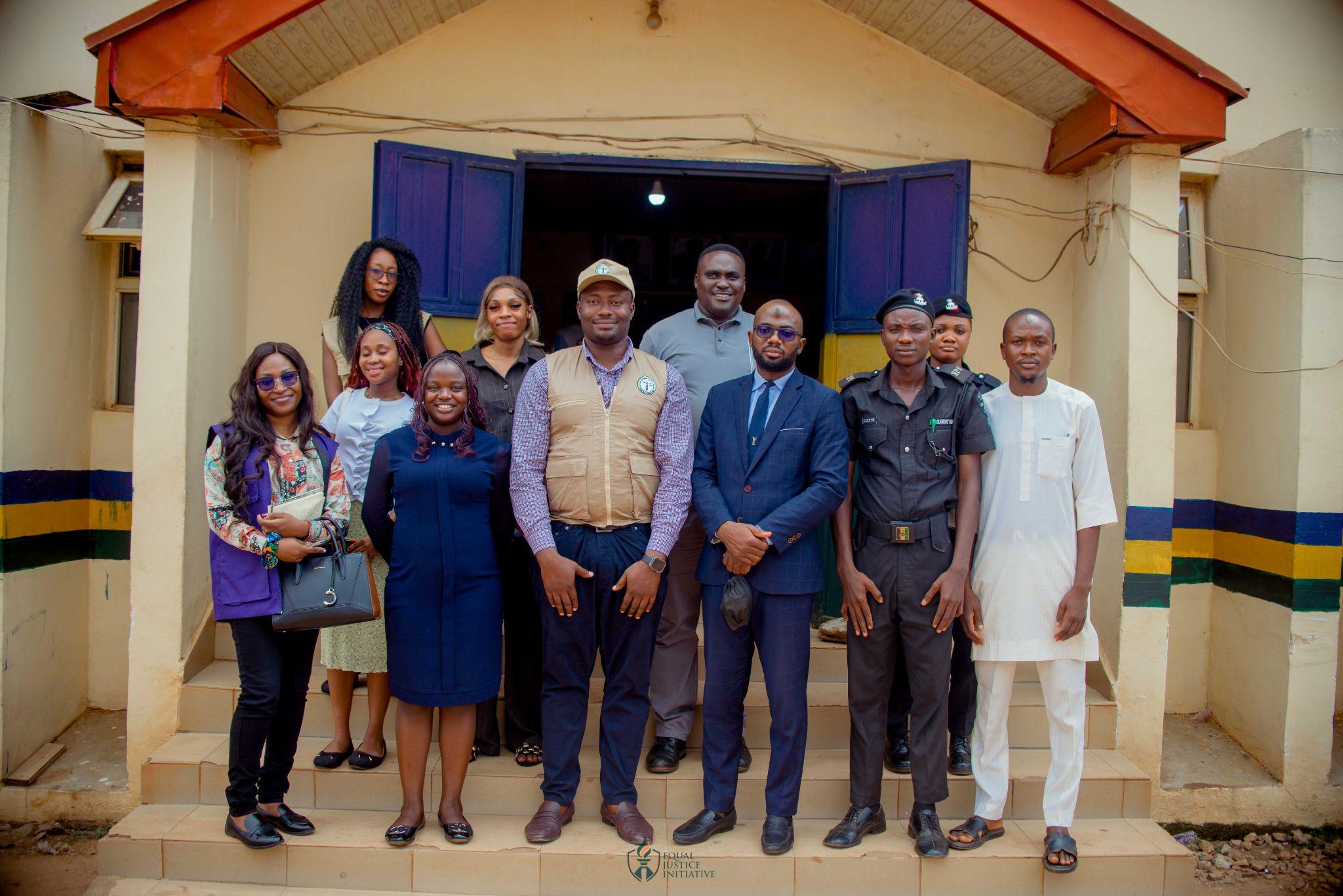 Monitoring team outside the Nyanya Police Division